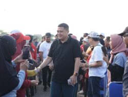 Warga Manggala & Munafri-Aliyah Kompak Bersihkan Waduk
