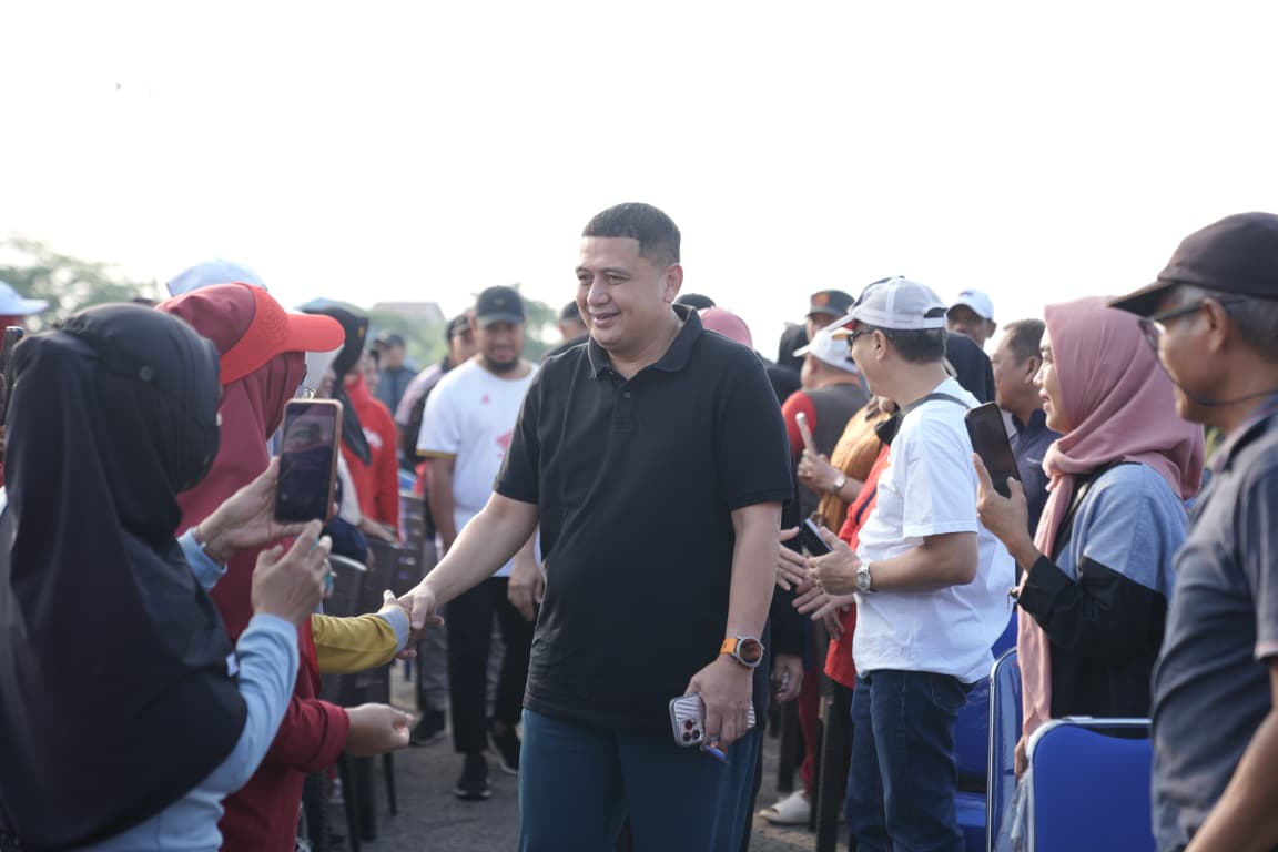 Warga Manggala & Munafri-Aliyah Kompak Bersihkan Waduk